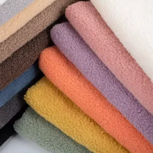 100 Polyester Double Sided Curly Sherpa Teddy Fleece Fabric for Winter Blanket Womens Coat Clothing