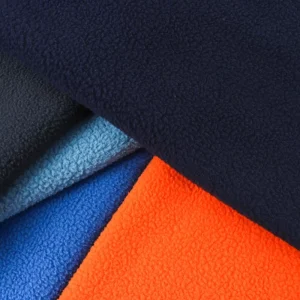 100% Polyester Knitted Double Brushed Single Jersey Faux Lambswool Sueded Plain Dyed Fleece Fabric Stock Autumn Winter Warm Bag