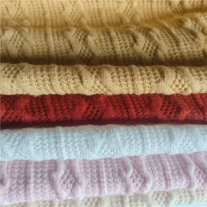 100% Polyester Knitted Fabric for Women Coarse Needle Jacquard Design 200 330gsm Thick Top with Stylish Twist Design