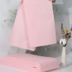 25x70cm Pink Disposable Nonwoven Bath Towel Quick Dry Customizable One Time Used for Home and Salon