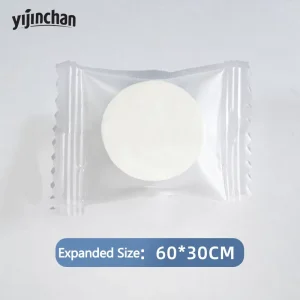 30*60cm Candy Wrapped Pearl Embossed Biodegradable Compressed Towel Unique Non Woven Disposable Travel Hotel Amenity
