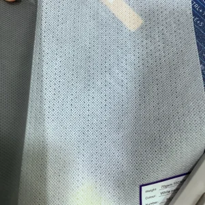 60gsm 70 Gsm Fire Retardant 100% PP Perforated Nonwoven Fabric Anti Skid Non Woven Fabric For Mattress Sofa Botton Use