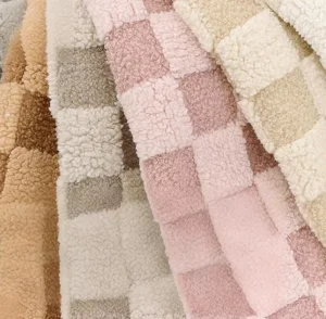 Colorful 100% Polyester Jacquard Knitted Faux Fur Cotton Wool Fabric for Garment Blanket Home Textile Cushions