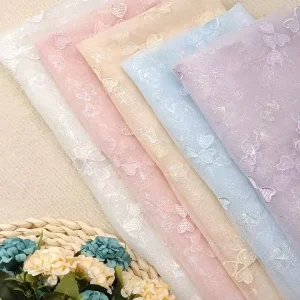 Factory Direct Sales Iridescent Bow Embroidered Tricot Heavyweight Mesh Fabric 100% Polyester Anti-Static Girls Accessories
