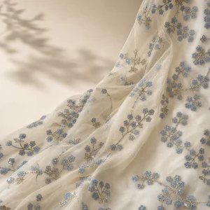 High Quality Eco Friendly Woven Light Blue Small Floral Embroidery Ivory Shimmer Tulle Mesh Fabric for Girls Wedding Gown Bridal