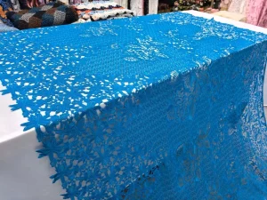 High quality Breathable Nonwoven Lake Blue Guipure Lace Fabric with Unique Patterns for Wedding and Custom Clothing