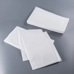 Hotel Hospitality 4Pcs Disposable Bed Sheet Set Bedding Non-Woven Duvet Cover Pillowcases Custom Logo Bulk Supply