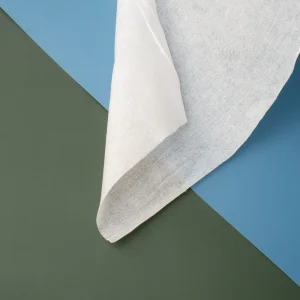 Manufacturer 100% Polyester Spunlace Nonwoven Fabrics Plain Parallel Emboss Breathable Roll Cross Anti Static Free Sample for