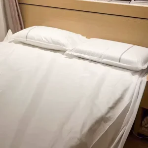 Nonwoven Bed Sheet Set Quilt Cover Pillowcase Hotel Luxury Double Travel Disposable Bedding Four Piece Set
