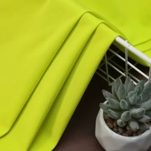 OEM ODM Waterproof Plain Dyed Woven 100D 160gsm 100% Polyester Mini Ripstop Fabric for Coat Clothing Pants Shorts Jacket Garment