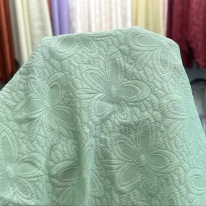 Stretch Bubble Jacquard Fabric for Qipao Dress Kidswear and Apparel